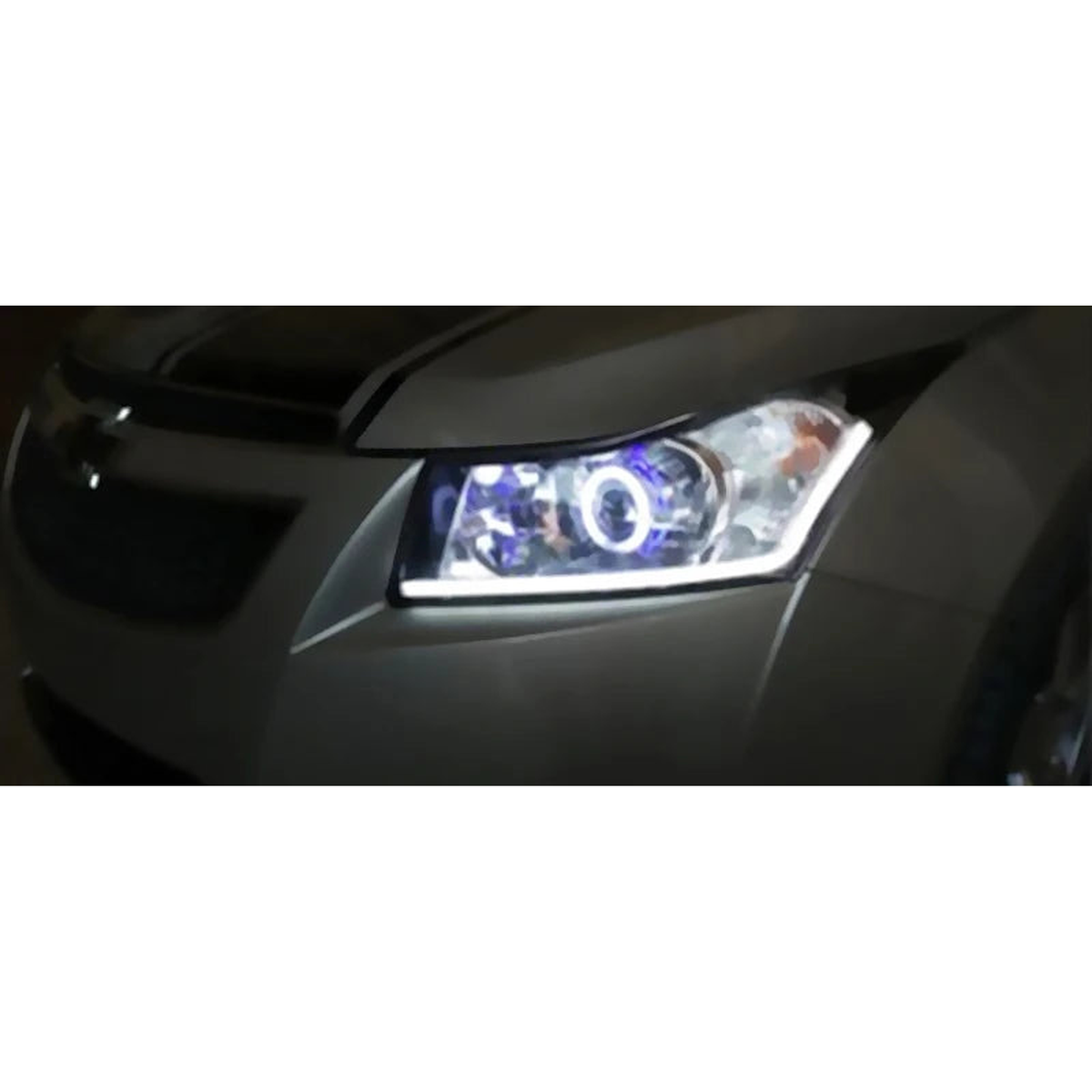 White LED DRL strip lit along the lower edge of a headlight, installed example, universal fit for BMW