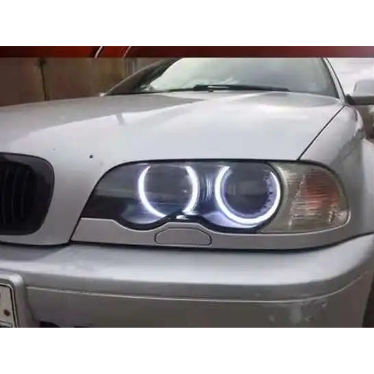 Halo ring angel eyes installed on a BMW E39 headlight for BMW 3/5/7 Series E36, E38, E39, E46