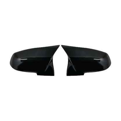 Gloss black mirror cap pair, front view, for BMW F20 / F22 / F30 / F32 and X1 E84