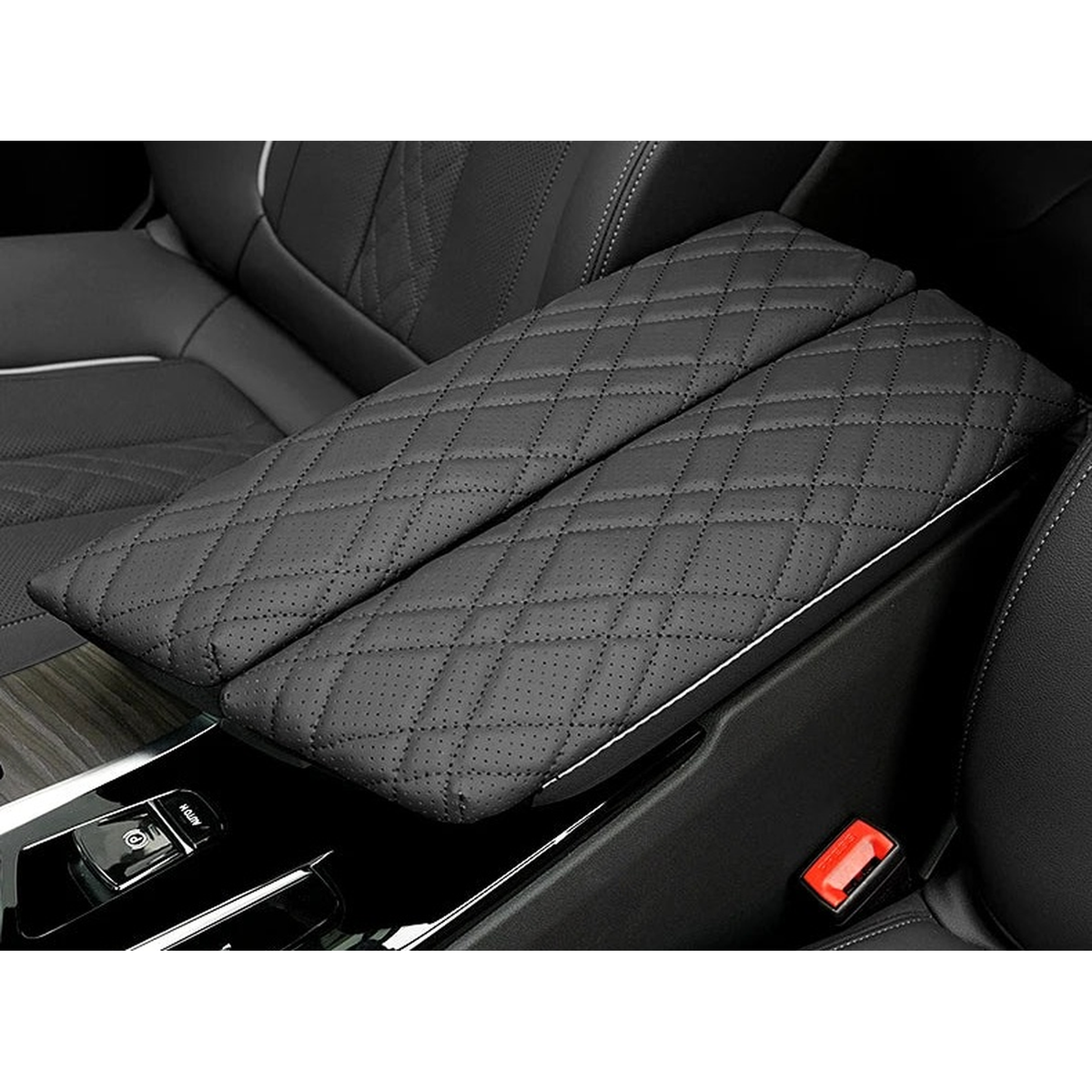 Black quilted armrest cover pads fitted on the centre console, for BMW 5 Series G30 / G38 and 6 GT G32