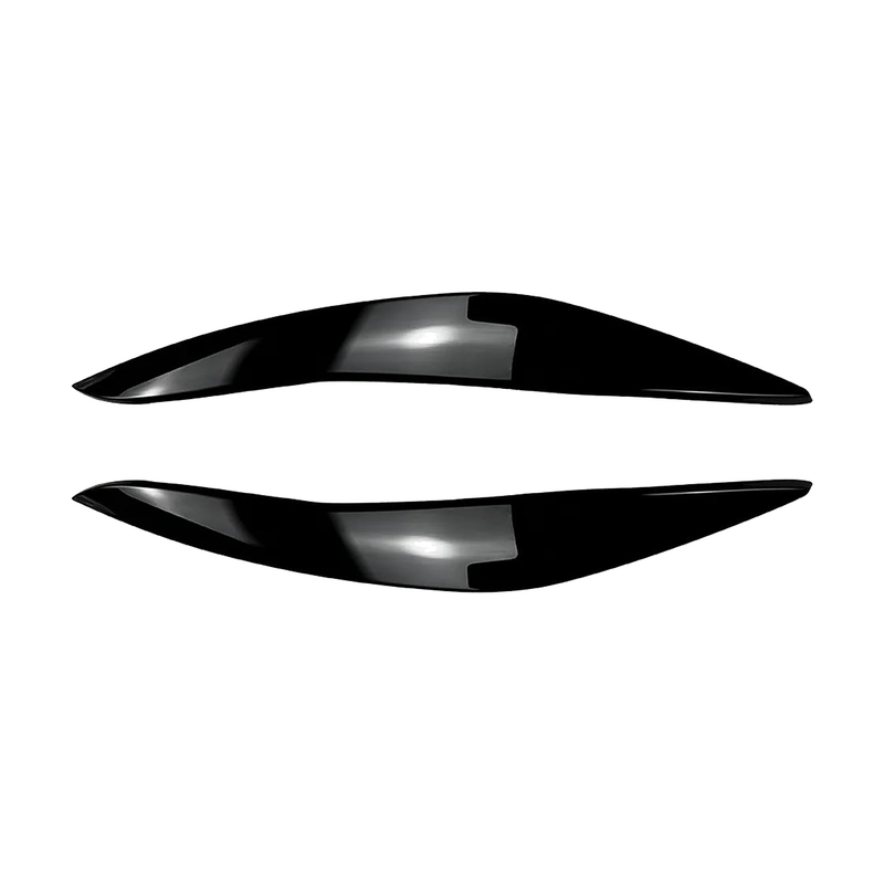 Gloss black headlight eyelid trim pair for BMW 5 Series F10 / F11, front view