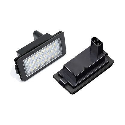 LED license plate light for BMW E38, pair, connector and lens view