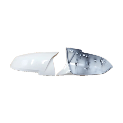 Gloss white mirror cover overlay pair showing outer shell and inner side, for BMW F20 / F30 / F32 / E84