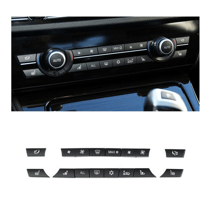 BMW F10 climate control panel with replacement button caps fitted