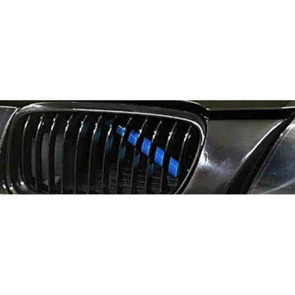 Blue kidney grille V-brace bars installed on a BMW 3 Series E90, E91, E92, E93 (2006-2013) grille