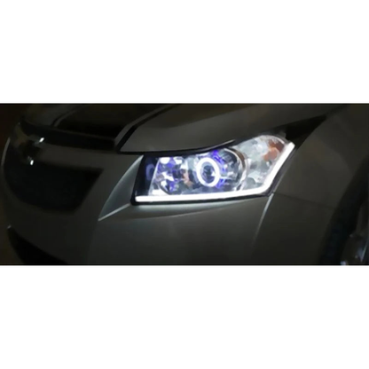 White LED DRL strip lit along the lower edge of a headlight, installed example, universal fit for BMW