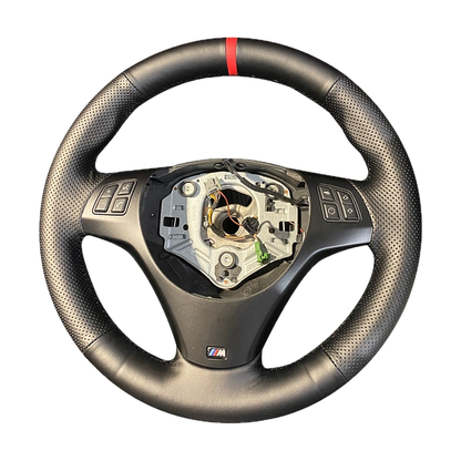 Black leather stitch on steering wheel cover fitted on an M Sport wheel, front view, for BMW E87 / E90 / E92 / E84