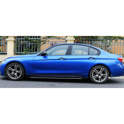 Carbon fiber look side skirt stripe decal fitted on a blue sedan, for BMW F30 / F31 / F35, side view