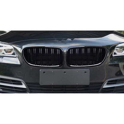 Gloss black double slat kidney grilles fitted on a dark grey BMW 5 Series F10 / F11 / F18