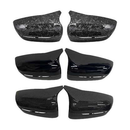 Mirror cap pairs in forged carbon, gloss black and carbon fiber look for BMW G20 / G30 / G11 / G14