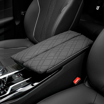 Quilted leather armrest cover installed in the center console of a BMW 5 Series G30, G38 and 6 Series GT G32
