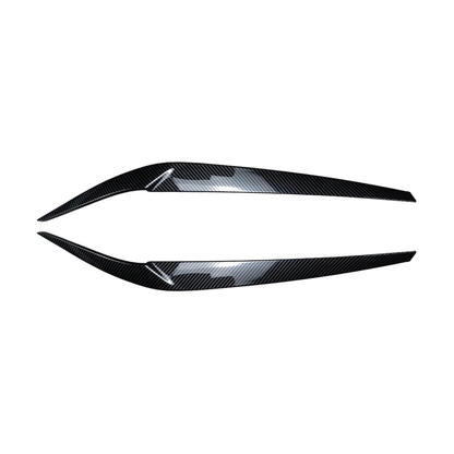 Carbon fiber look headlight eyebrow trim pair for BMW 5 Series G30 / G31 / G38 / F90 M5, front view