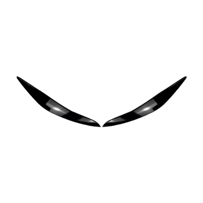 Gloss black headlight eyebrow covers, front view of pair, for BMW 5 Series F10 Pre-LCI (2010-2013)
