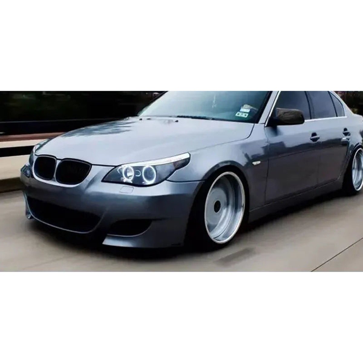 Bright black mirror cover cap fitted on a BMW 5 Series, for BMW E60 / E61 / E63 / E64 (2004-2008)