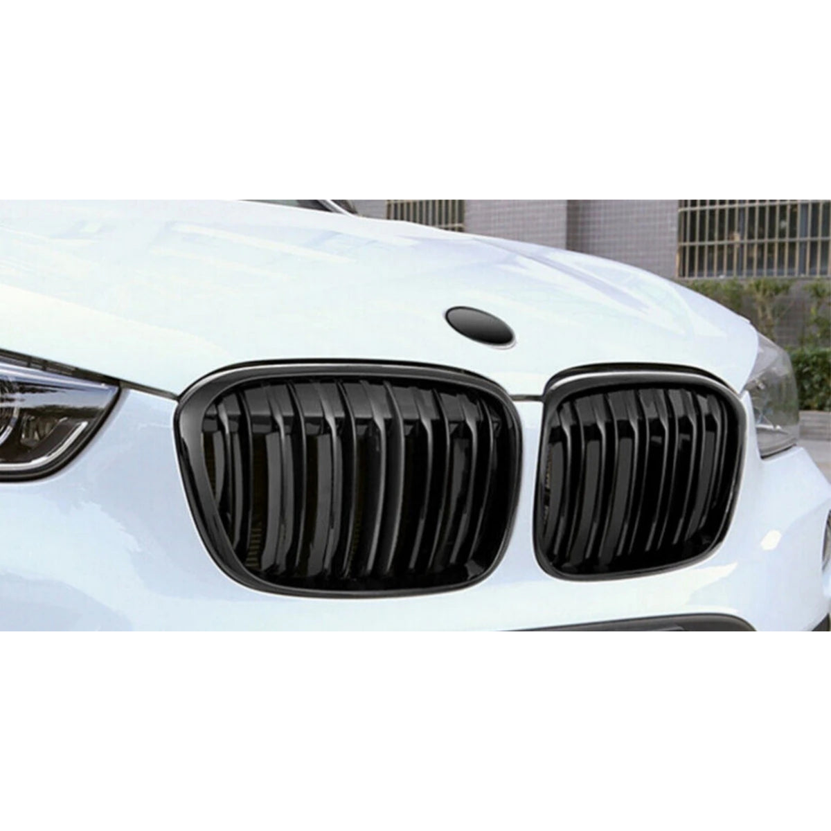 Gloss black kidney grille pair installed on a BMW X1 F48 (2015-2019), front view