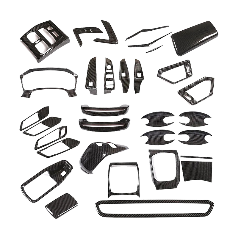 Carbon-look interior trim covers, selection of pieces laid out, for BMW 3 Series G20 LHD 2020-2022