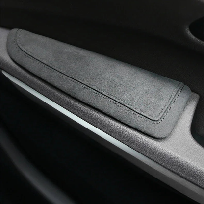Black Alcantara elbow pad fitted on the door armrest for BMW F30 / F20 / G20 / G30 / G01 / E70 / E71