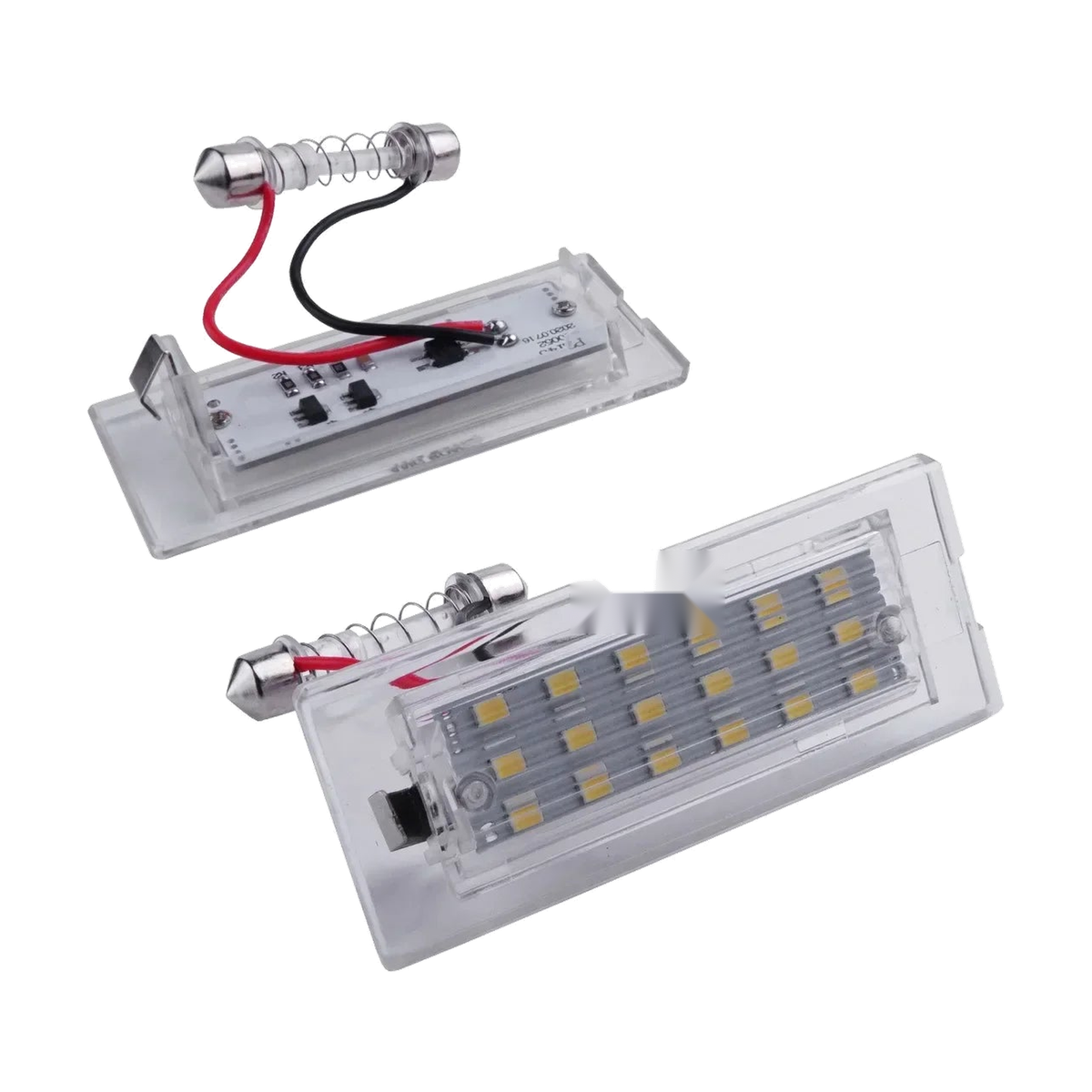 White LED license plate light pair, one open showing circuit board and wiring, for BMW E83 / E53