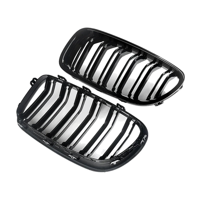Gloss black double-slat kidney grille pair, angled view, for BMW 5 Series F10 / F11 2010 to 2016