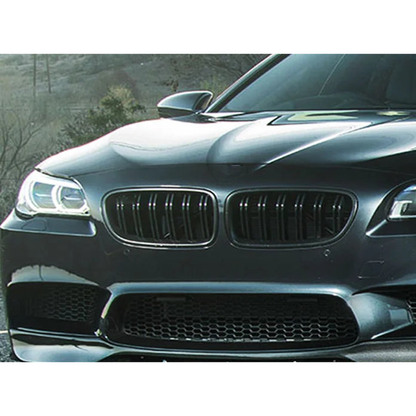 Gloss black double-slat kidney grille fitted to a BMW 5 Series F10 front bumper, close view