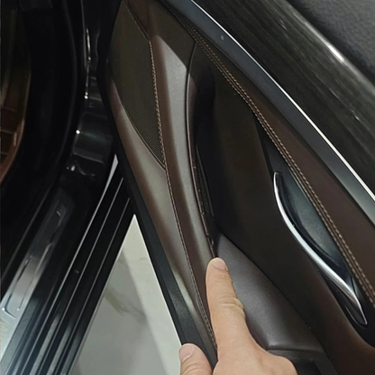 Leather door pull handle installed on a BMW 5 Series F10 door panel