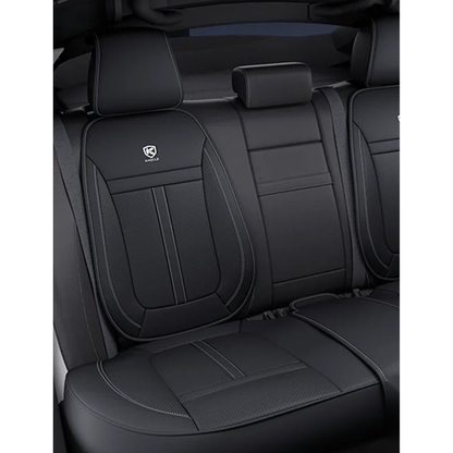 Black faux leather rear bench seat cover set, angled view, universal fit for BMW