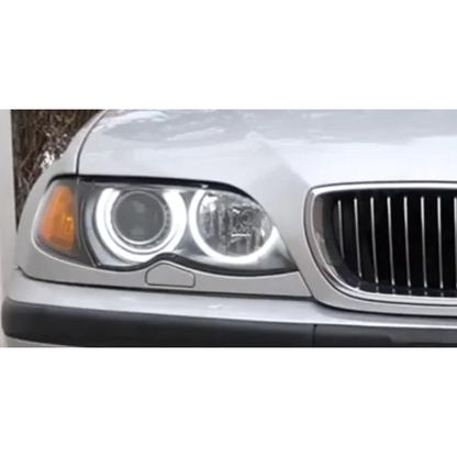 White LED angel eye halo rings lit inside a facelift headlight, fitted on BMW 3 Series E46 (1998-2006)