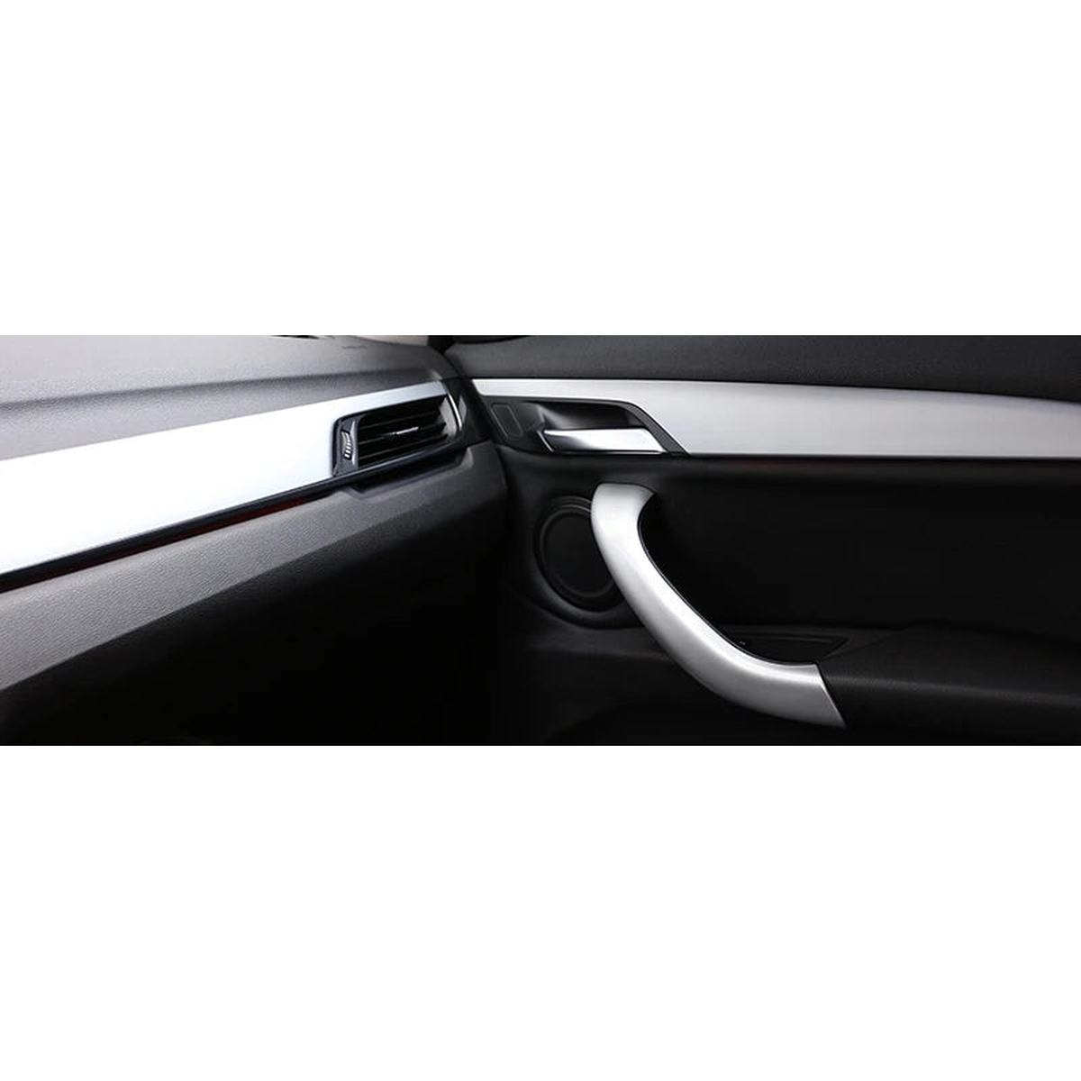Silver door pull handle cover installed on the interior door panel of a BMW X1 F48 / F49, X2 F39 (2016-2020)