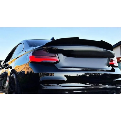 Trunk spoiler installed on a BMW 2 Series coupe, rear view, for BMW F22 / F87 M2 (2014-2020)